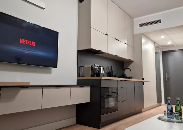 Alibi - Sympozjum Hotel apartamentowy 4*